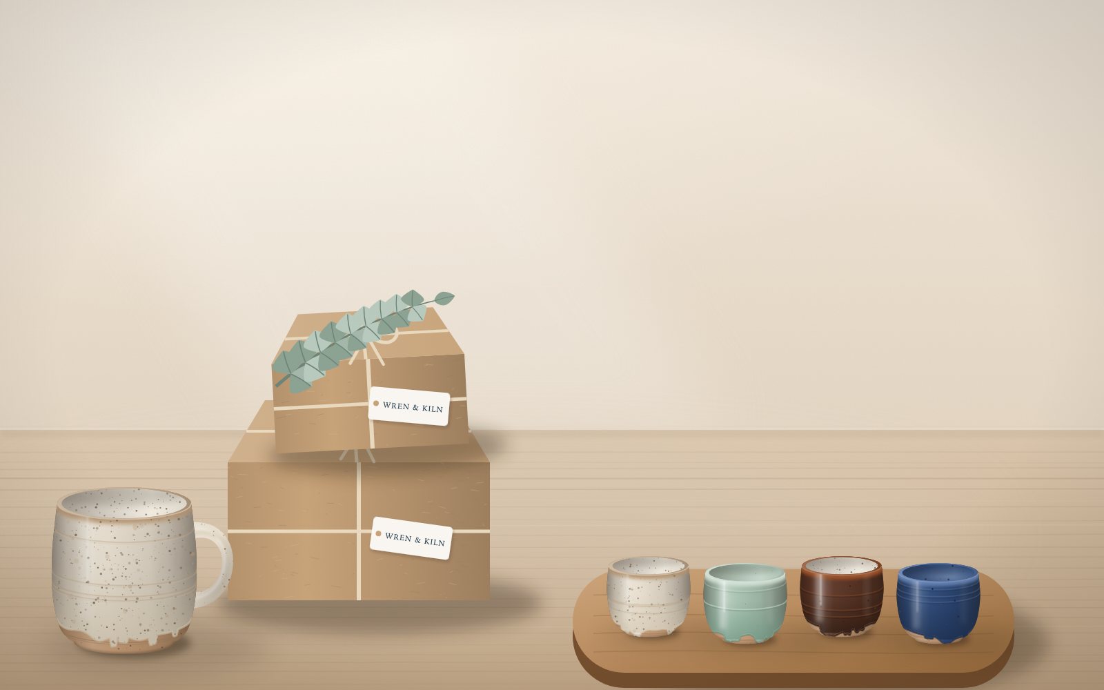 Wren & Kiln gift sets wrapped in kraft paper and twine (illustration)